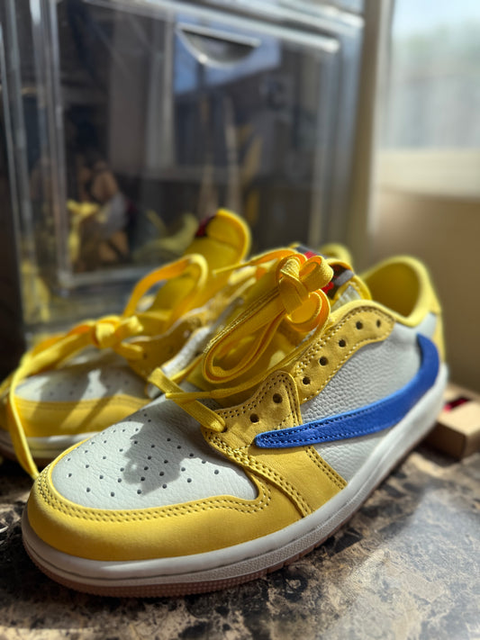 Jordan 1 Retro Low OG. Travis Scott Canary (women’s)